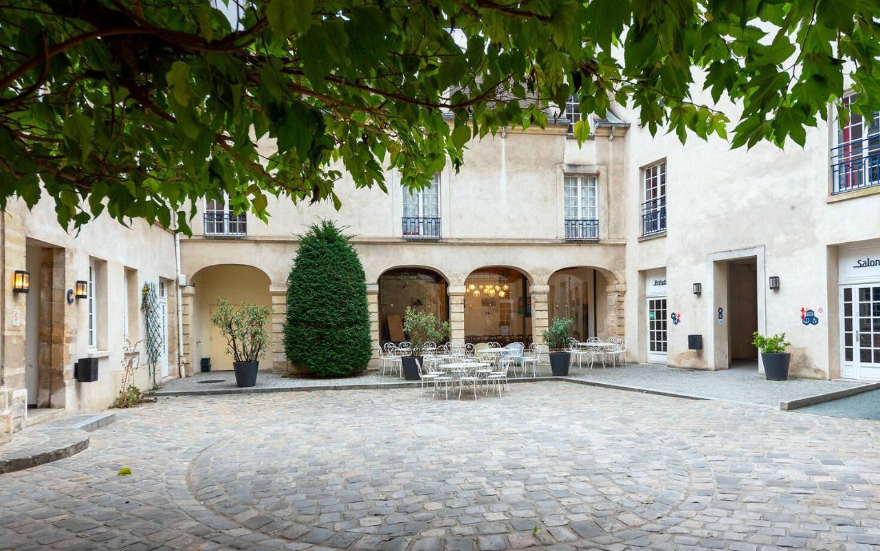 Mije Marais Hostel Paris Bagian luar foto The courtyard of the Hôtel de Ligne