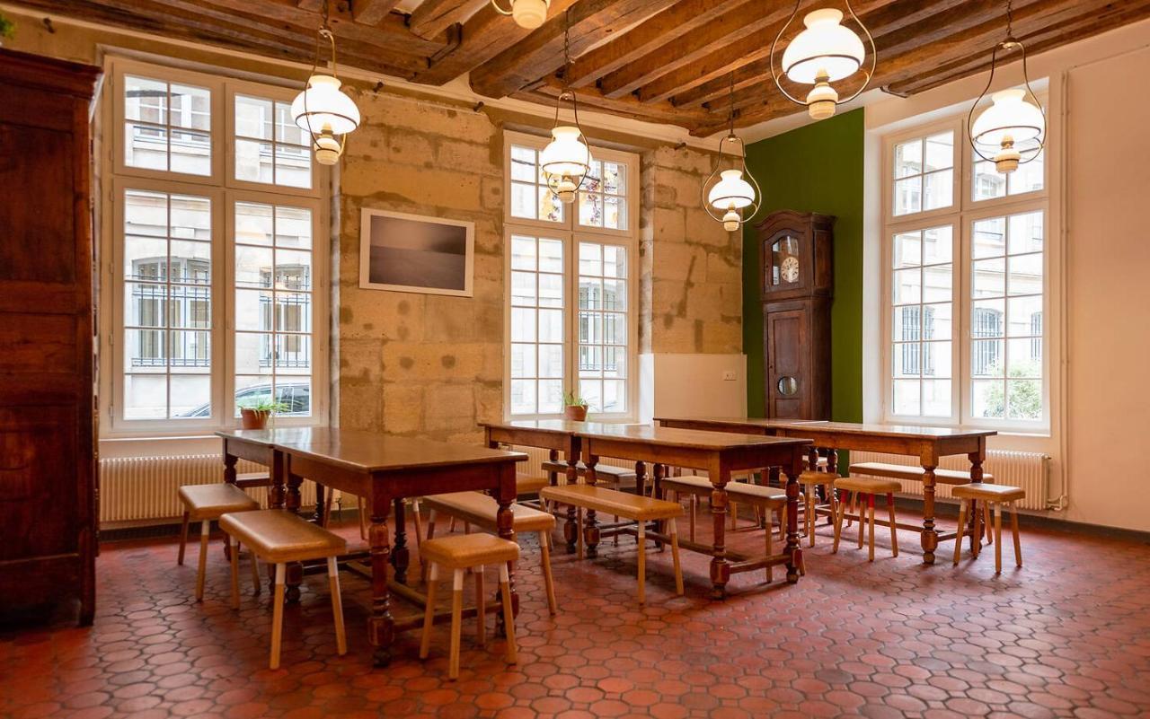 Mije Marais Hostel Paris Bagian luar foto The interior of the restaurant