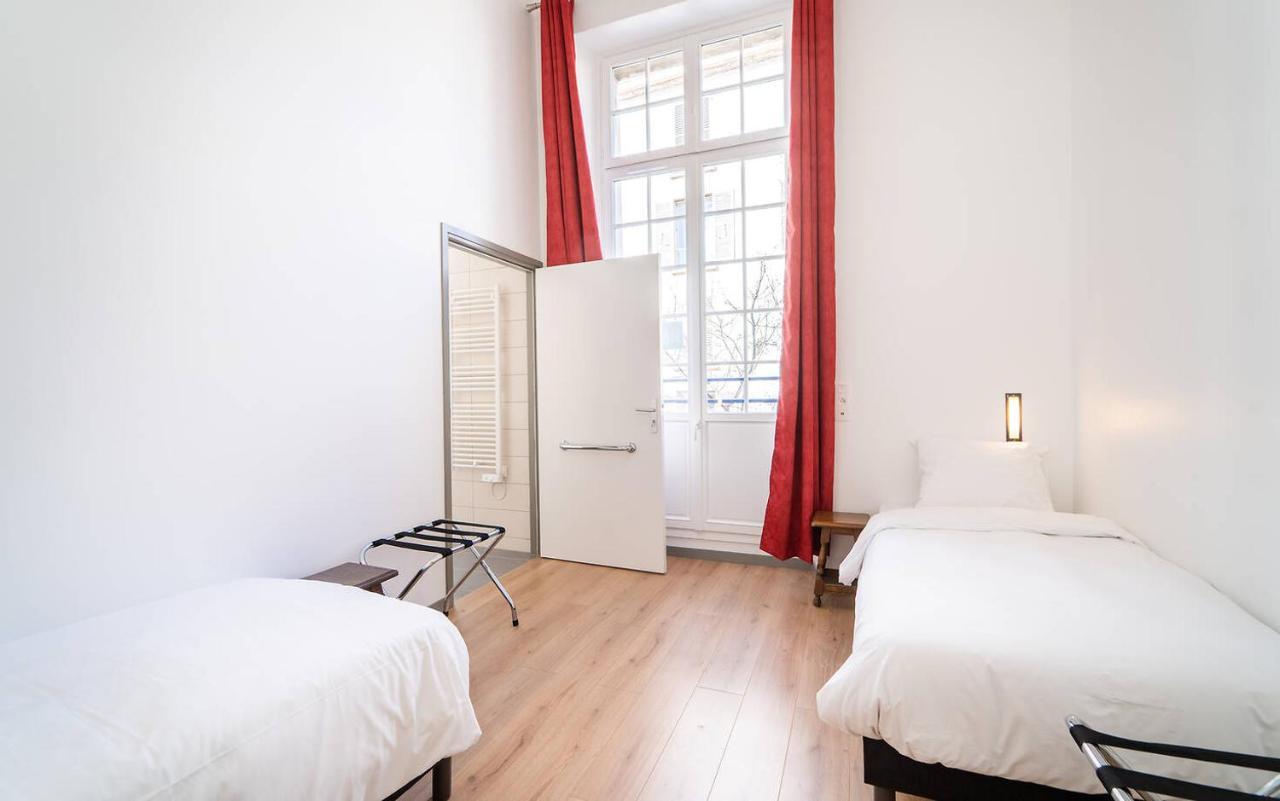 Mije Marais Hostel Paris Bagian luar foto A typical room at the hostel