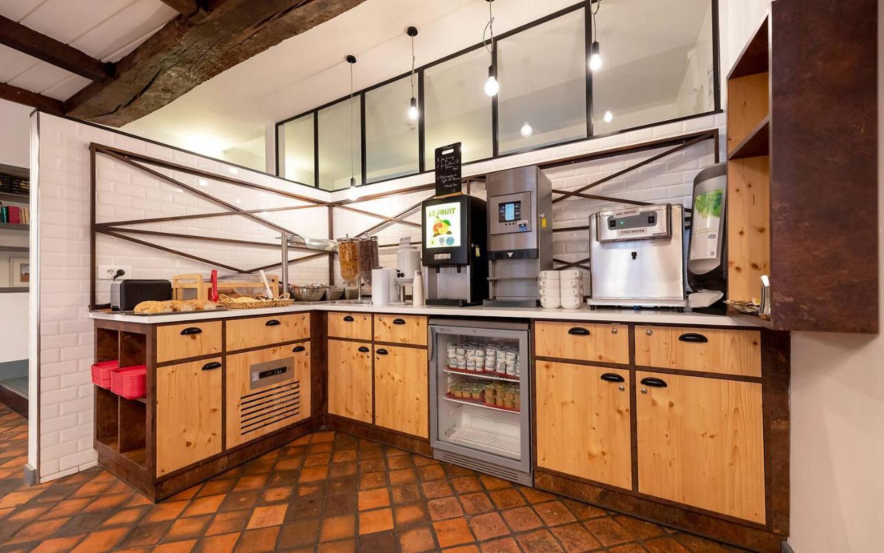 Mije Marais Hostel Paris Bagian luar foto A typical coffee bar