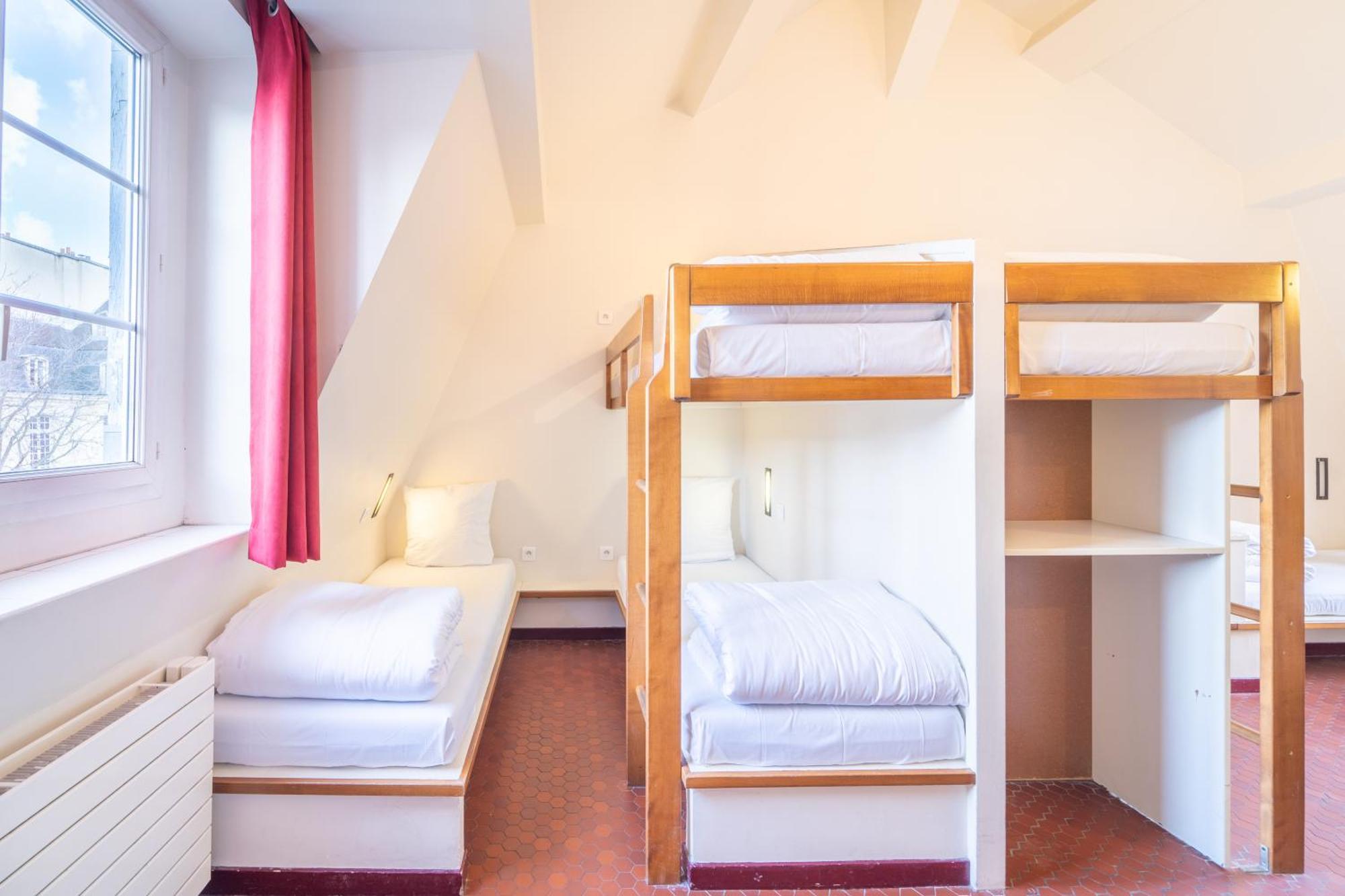 Mije Marais Hostel Paris Bagian luar foto A typical room at a hostel