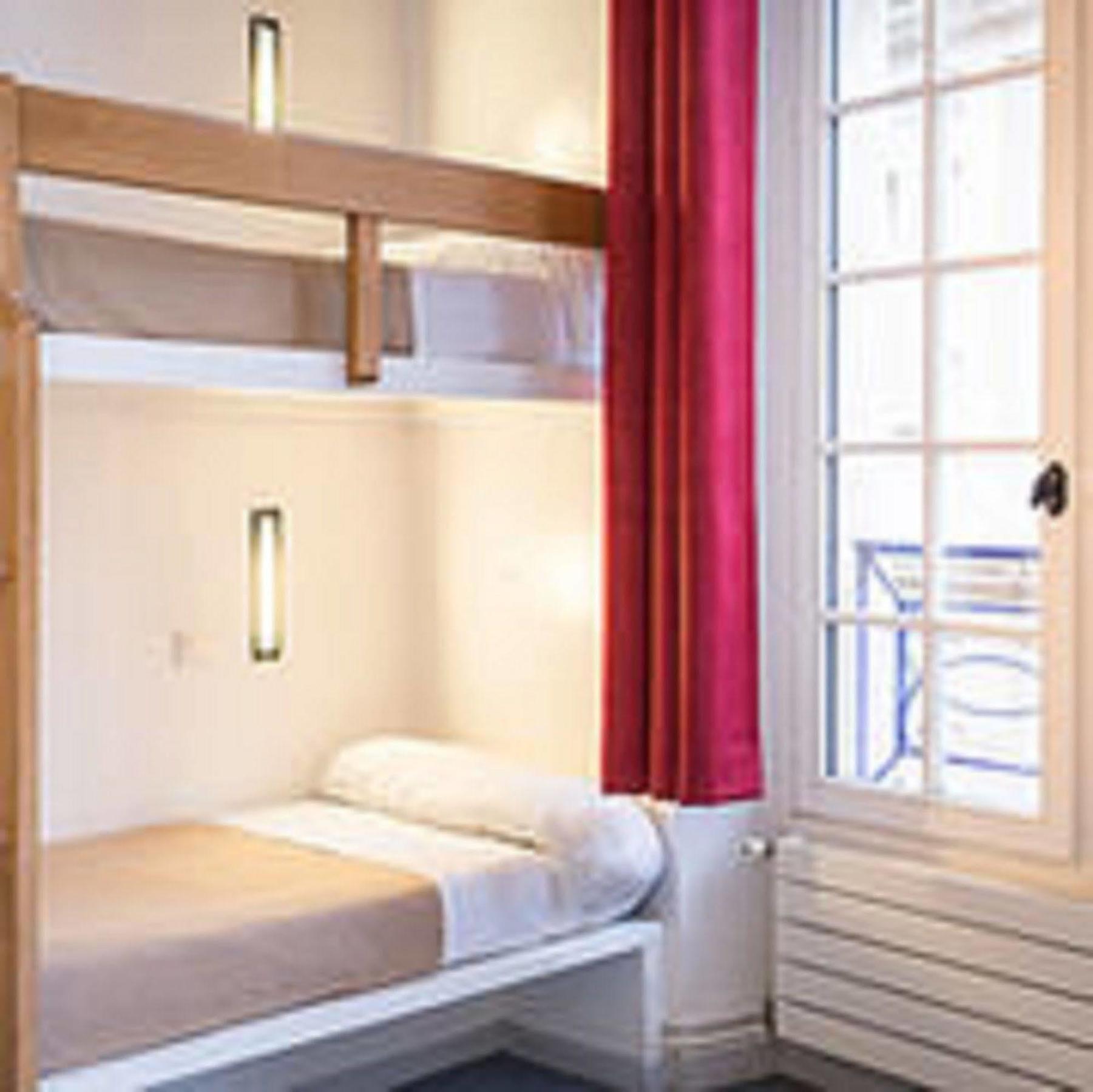 Mije Marais Hostel Paris Bagian luar foto A typical room at the hotel