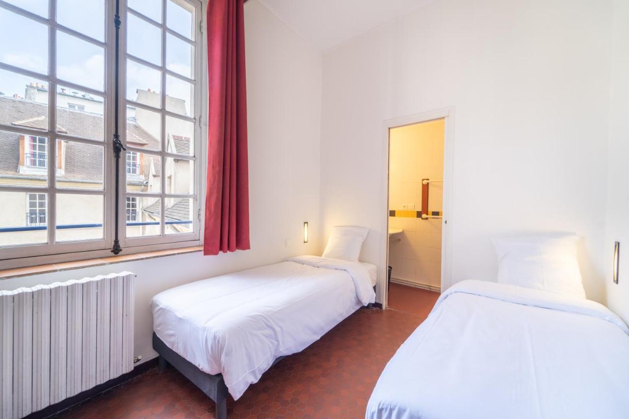 Mije Marais Hostel Paris Bagian luar foto A typical room at the hostel